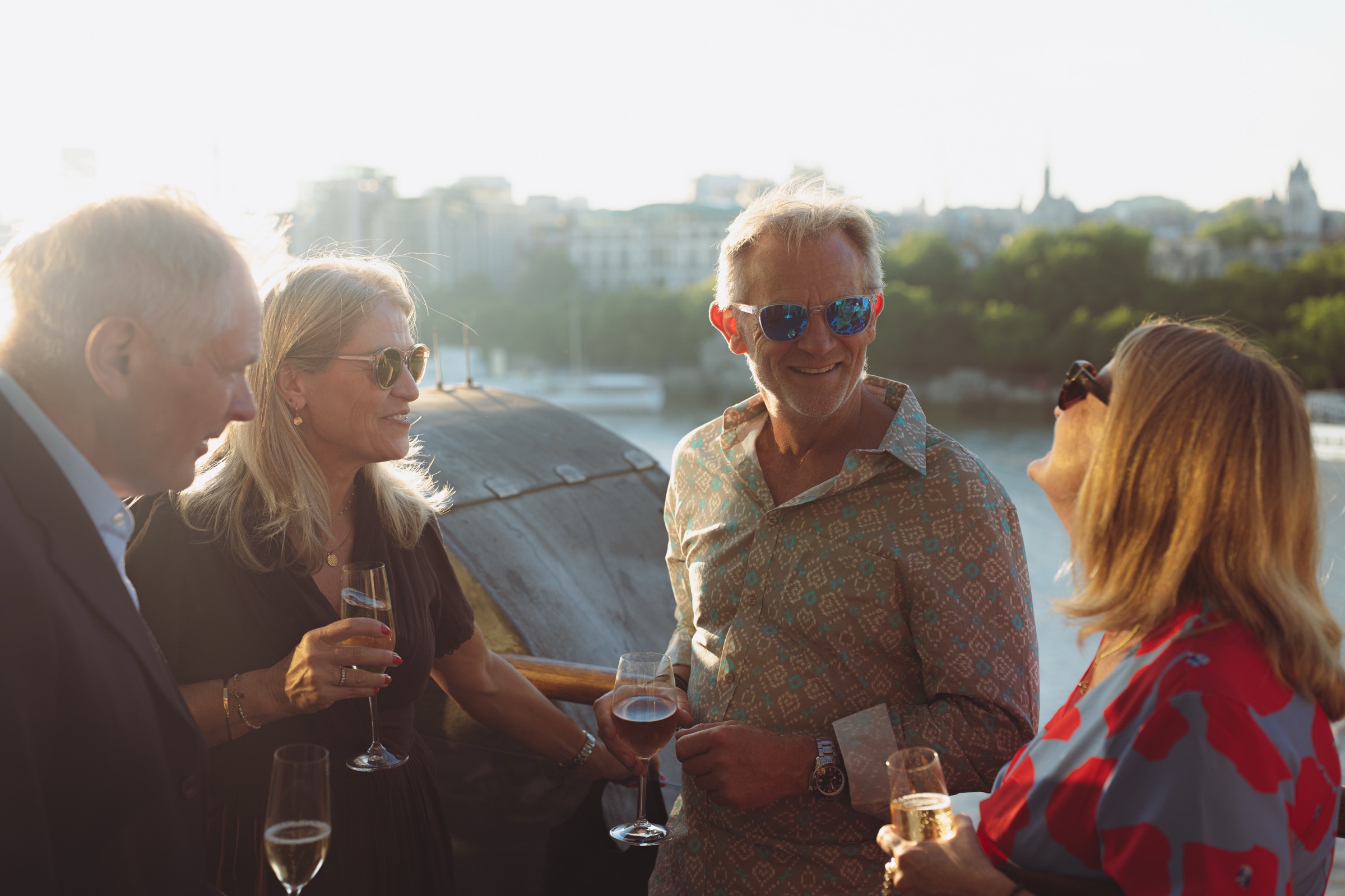 Guests sharing a moment together in warm sunlight